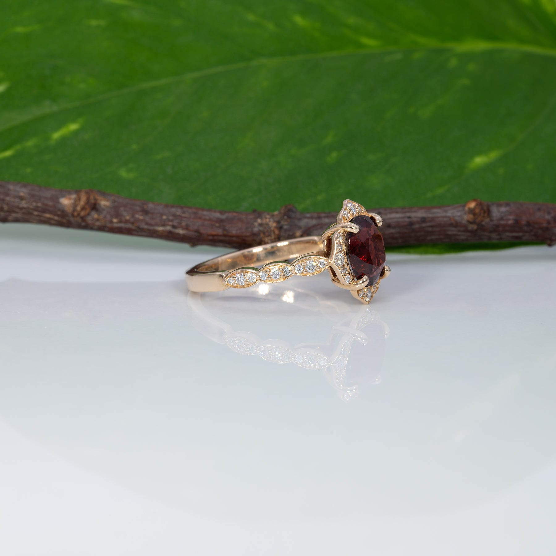 14K yellow gold red spinel ring with diamond accents
