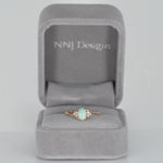 14K rose gold Ethiopian opal cabochon ring with diamond accents