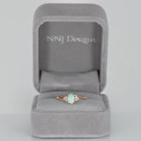 14K rose gold Ethiopian opal cabochon ring with diamond accents