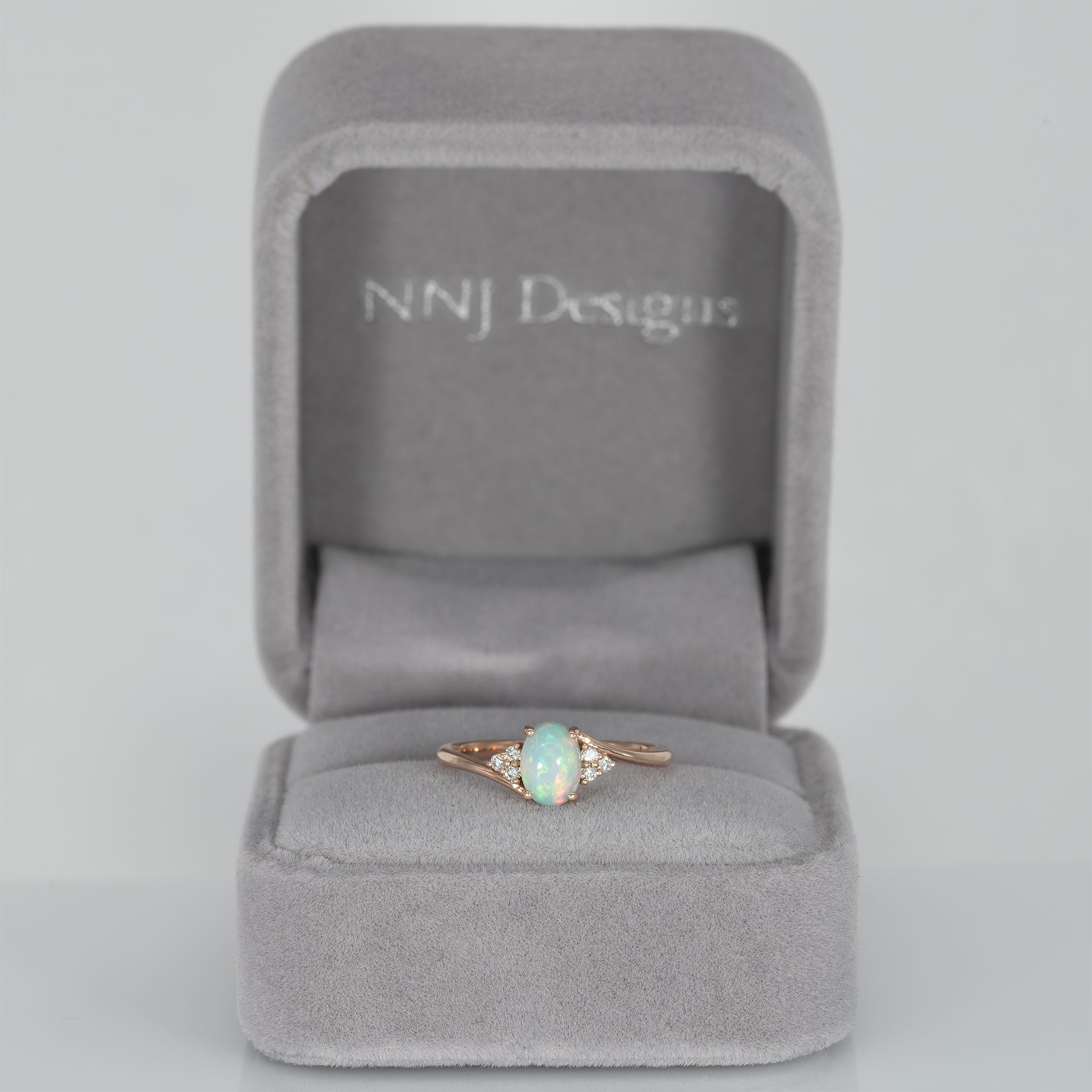 14K rose gold Ethiopian opal cabochon ring with diamond accents