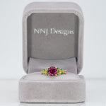 14K yellow gold purple garnet ring with tsavorite accents