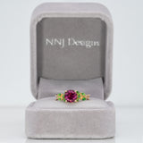 14K yellow gold purple garnet ring with tsavorite accents