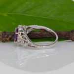 14K white gold pink sapphire oval ring with diamond halo
