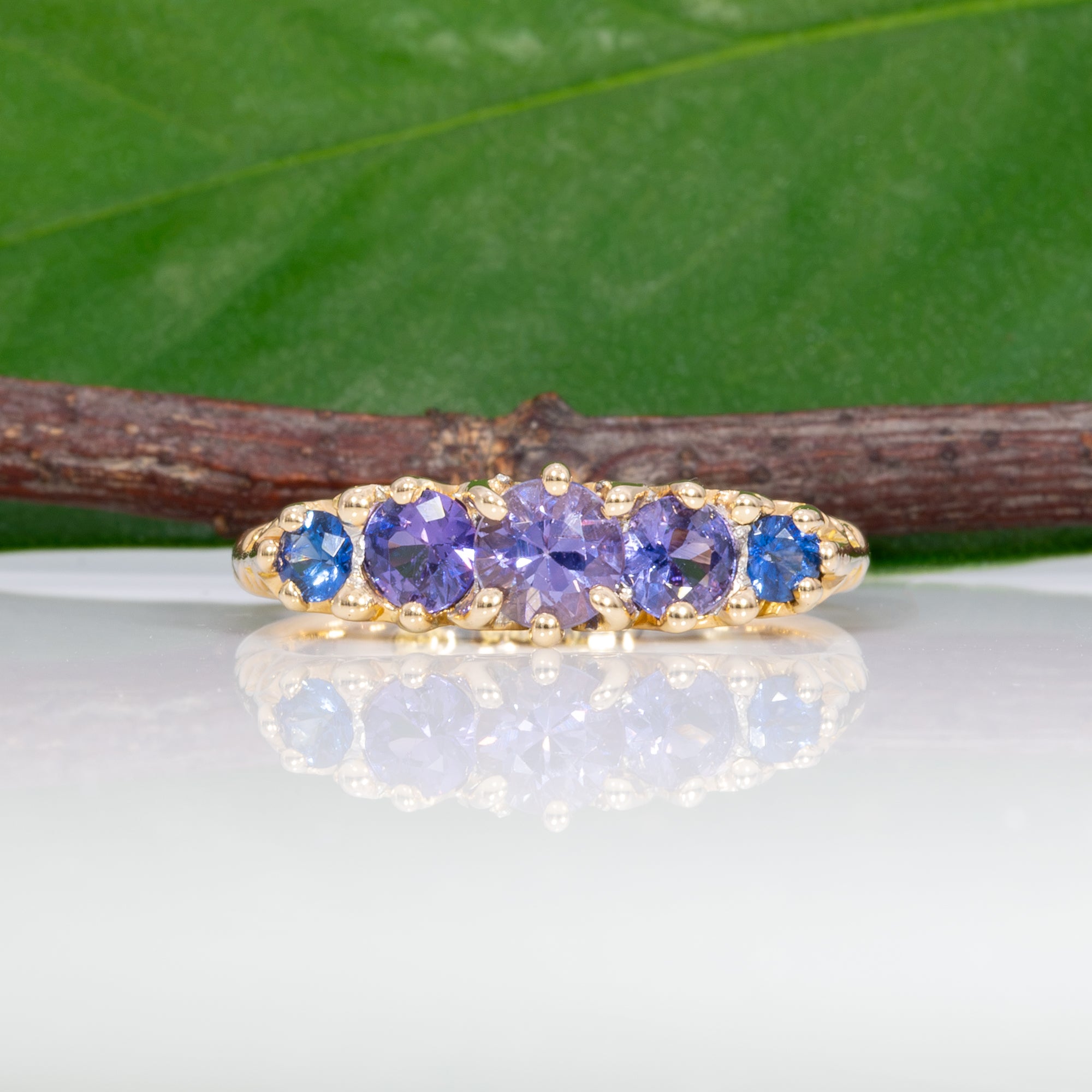 18K yellow gold estate ring with blue and purple sapphires