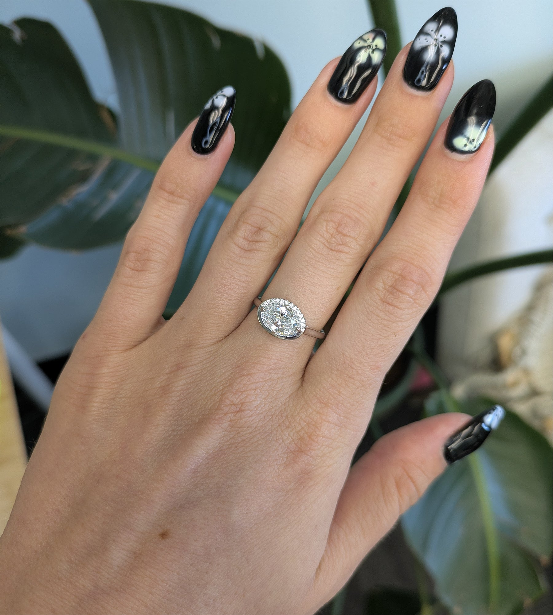 14K white gold oval lab grown diamond ring with diamond accents