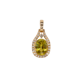 Sphene oval pendant with diamond accents in 14k yellow gold