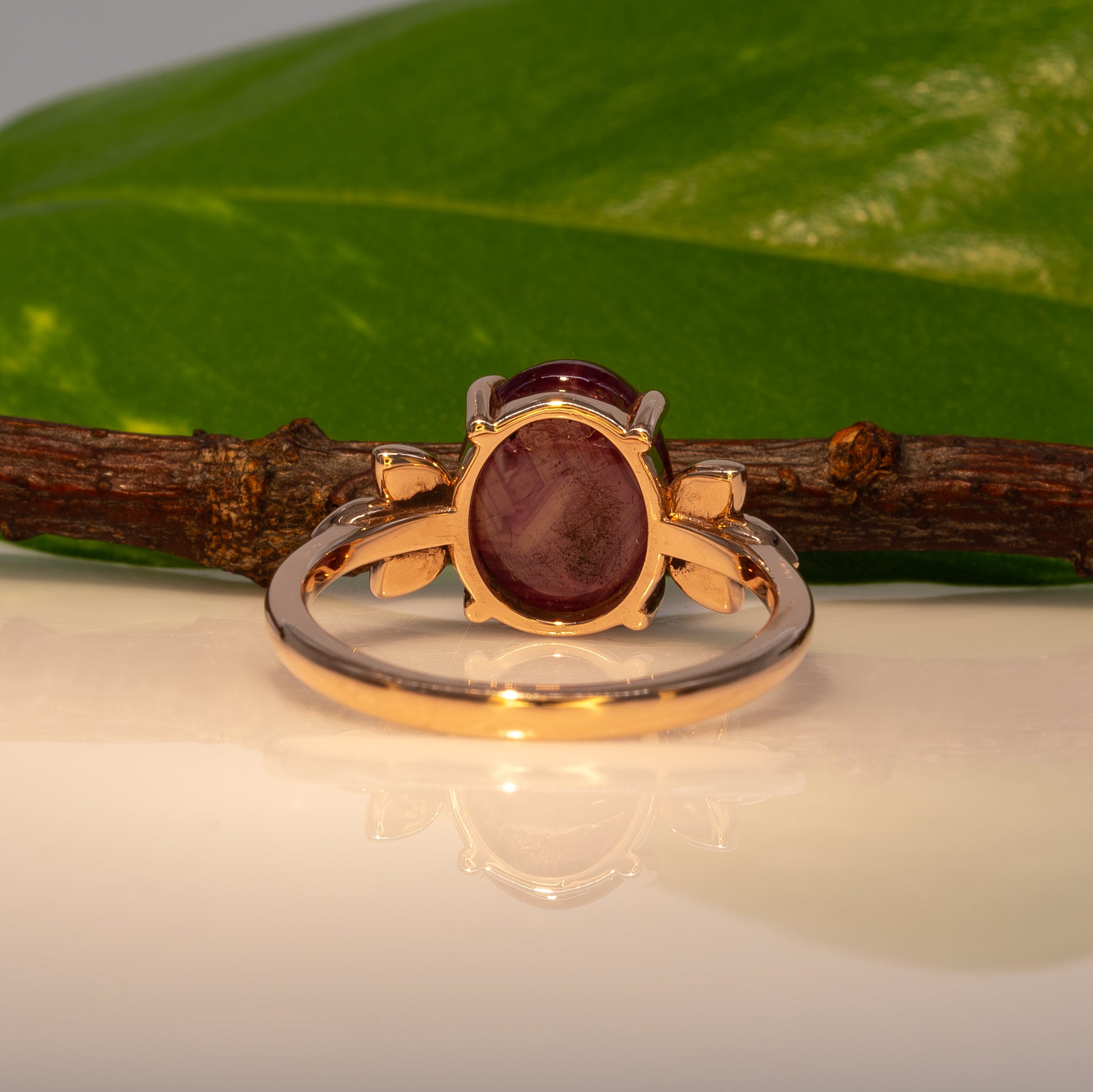 14K rose gold star ruby cabochon ring with diamond accents