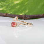 14K yellow gold padparadscha sapphire ring with diamond accents