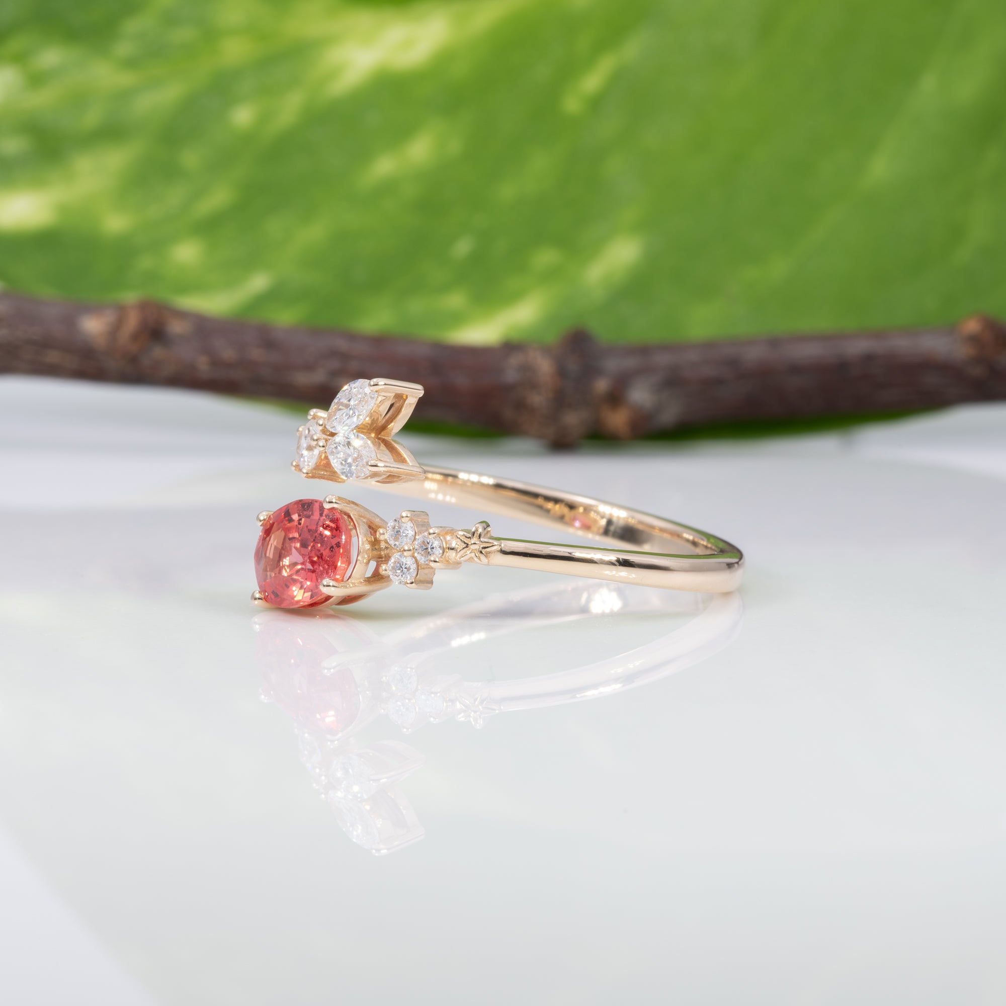 14K yellow gold padparadscha sapphire ring with diamond accents