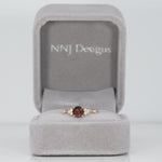14K yellow gold red spinel ring with diamond accents