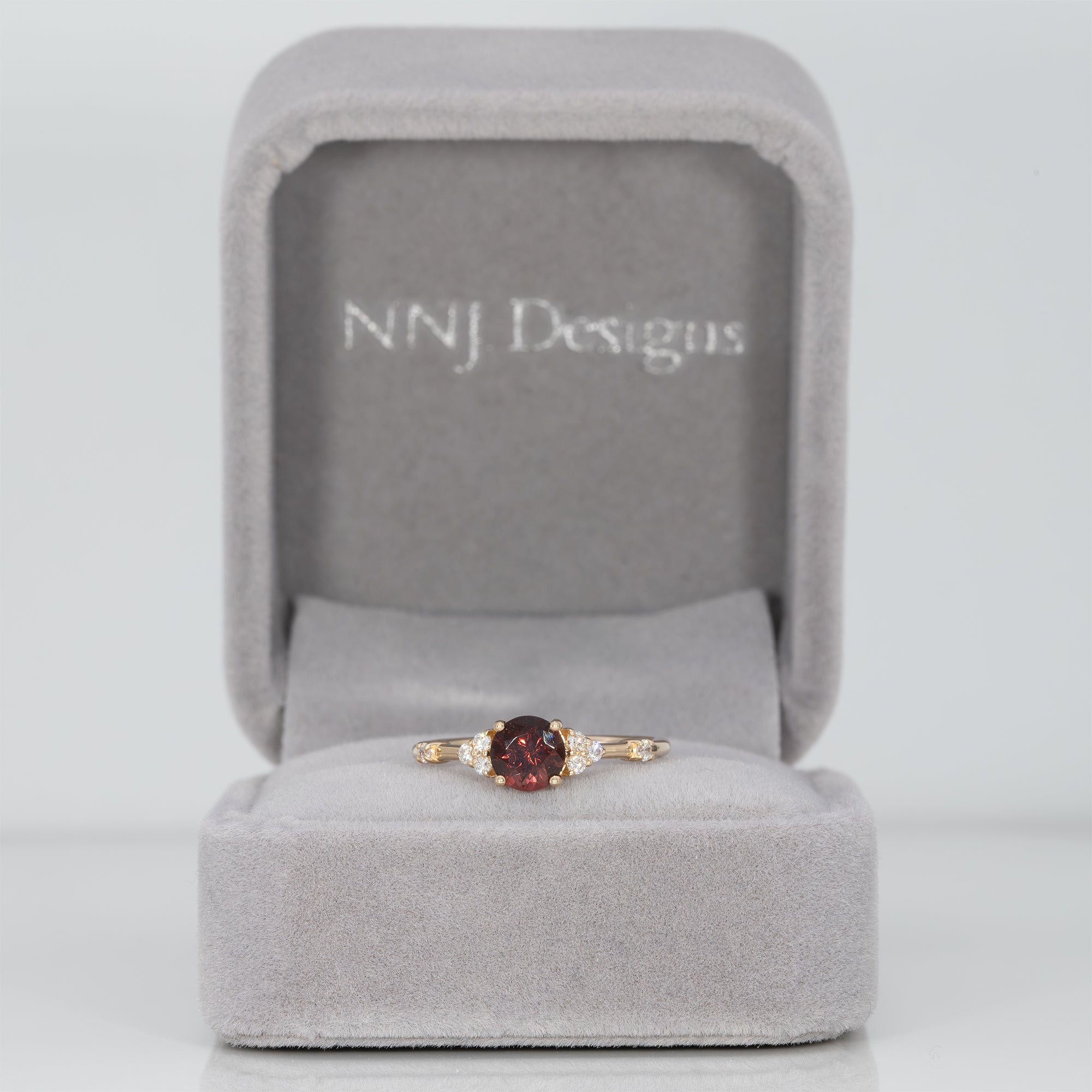 14K yellow gold red spinel ring with diamond accents