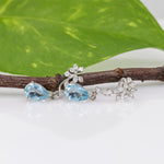 14K white gold aquamarine pear earrings with lab grown diamond accents