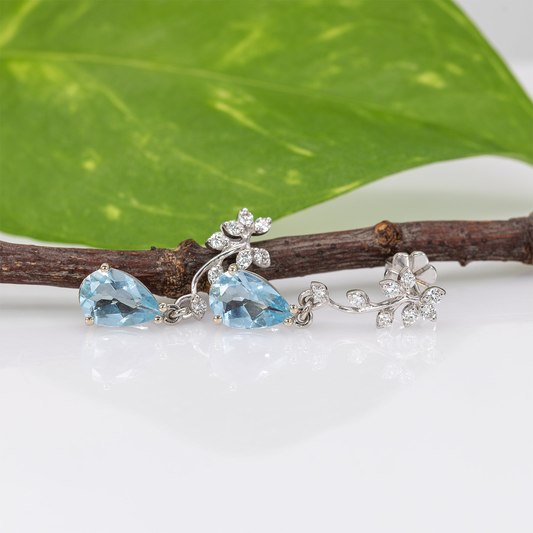 14K white gold aquamarine pear earrings with lab grown diamond accents