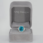 14K white gold Cambodian blue zircon cushion ring with diamond halo