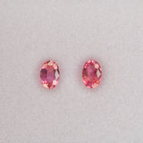 0.63 carat natural padparadscha sapphire, oval 6.1x4.2mm pink-orange loose gemstone