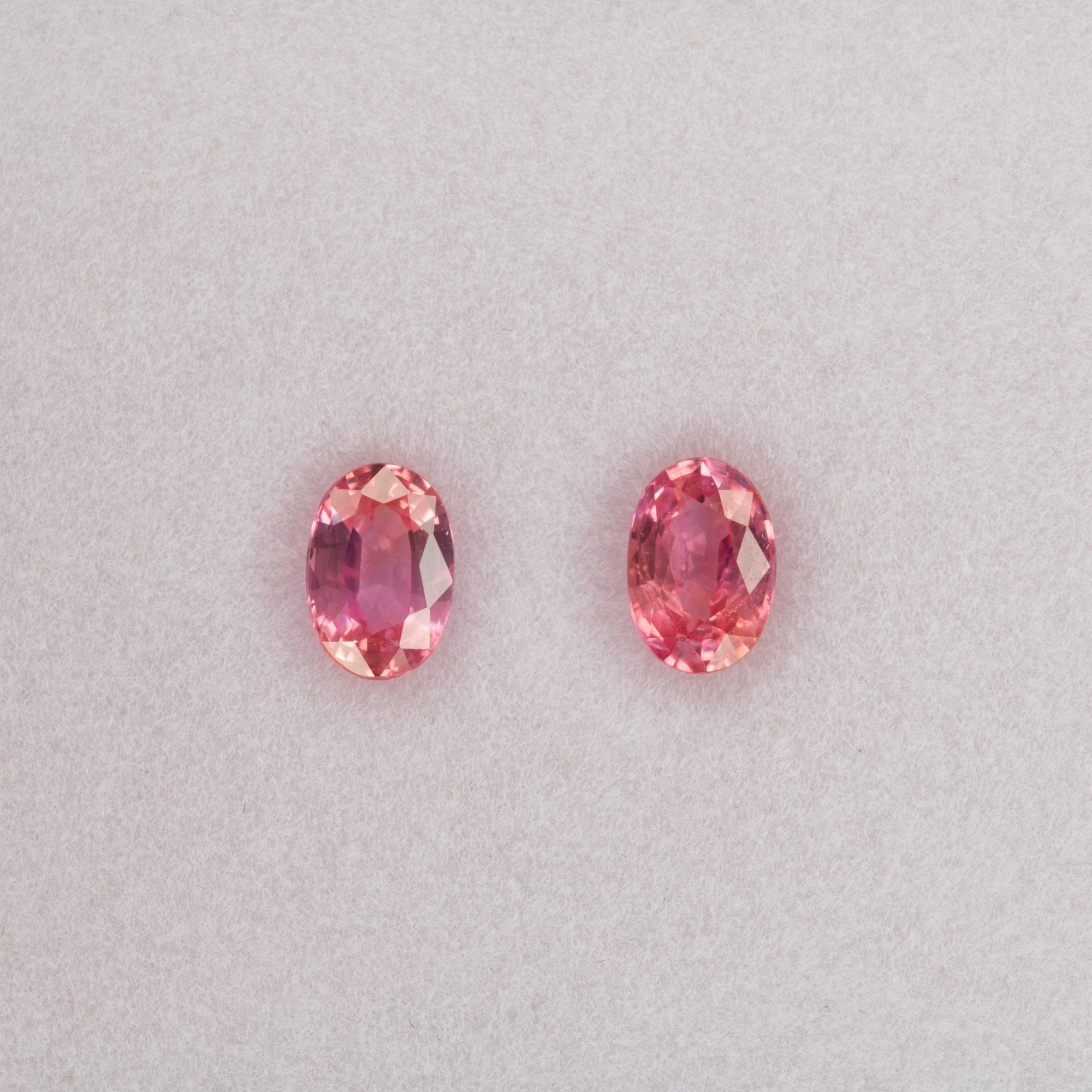 0.63 carat natural padparadscha sapphire, oval 6.1x4.2mm pink-orange loose gemstone