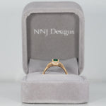 14K yellow gold Colombian emerald ring with diamond accents