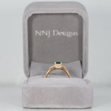 14K yellow gold Colombian emerald ring with diamond accents