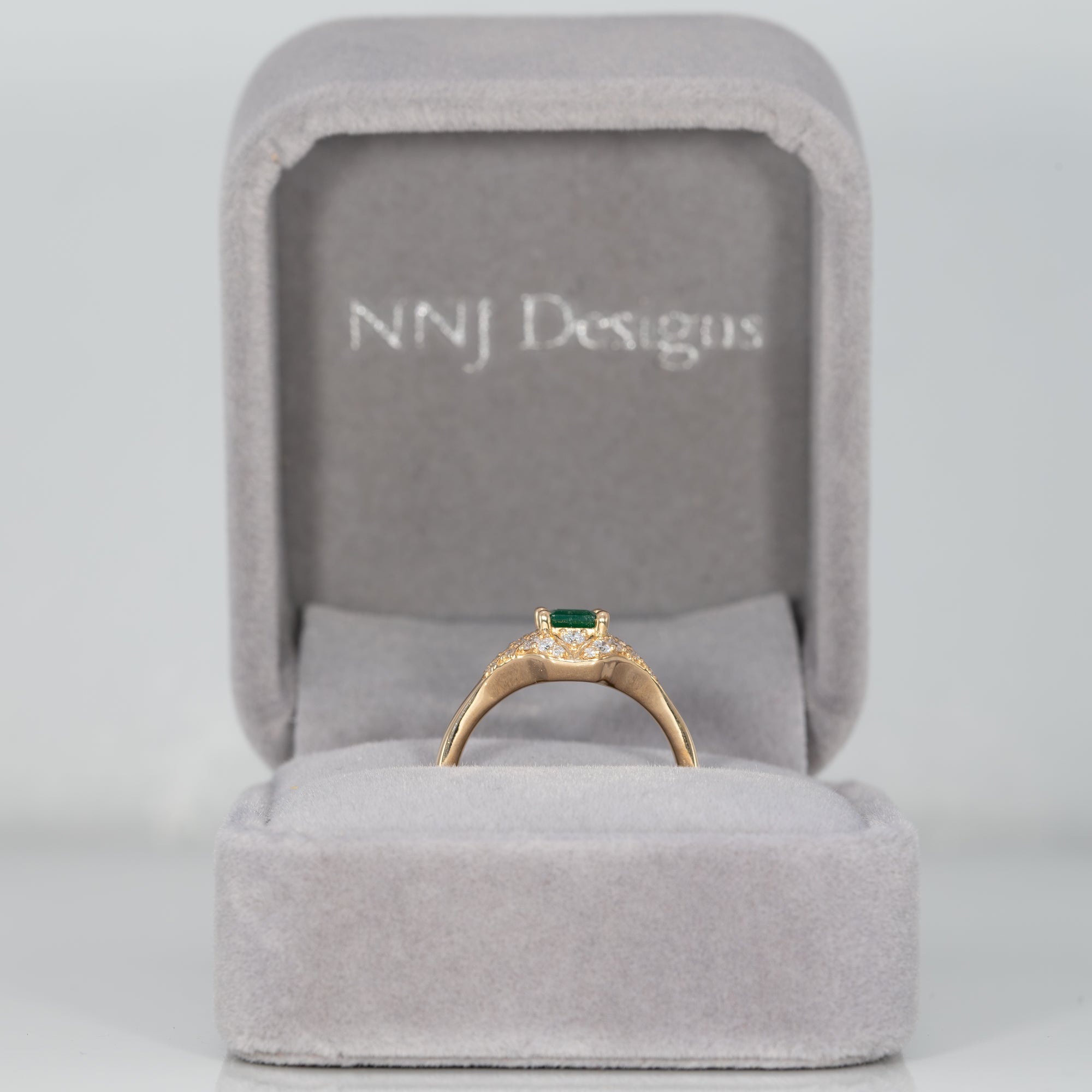 14K yellow gold Colombian emerald ring with diamond accents