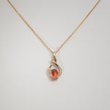 14K yellow gold padparadscha sapphire pendant