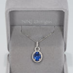 14K white gold tanzanite pendant