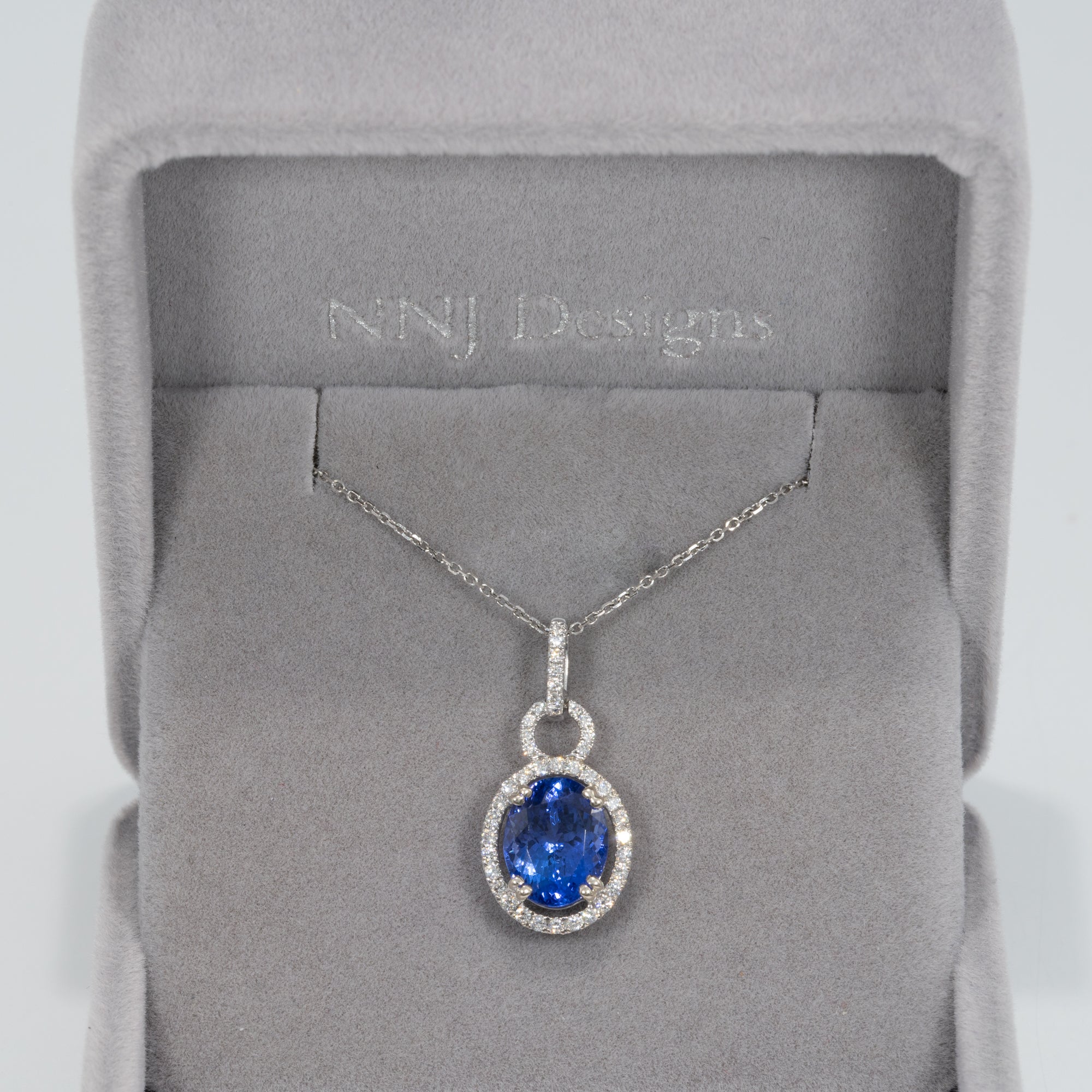 14K white gold tanzanite pendant