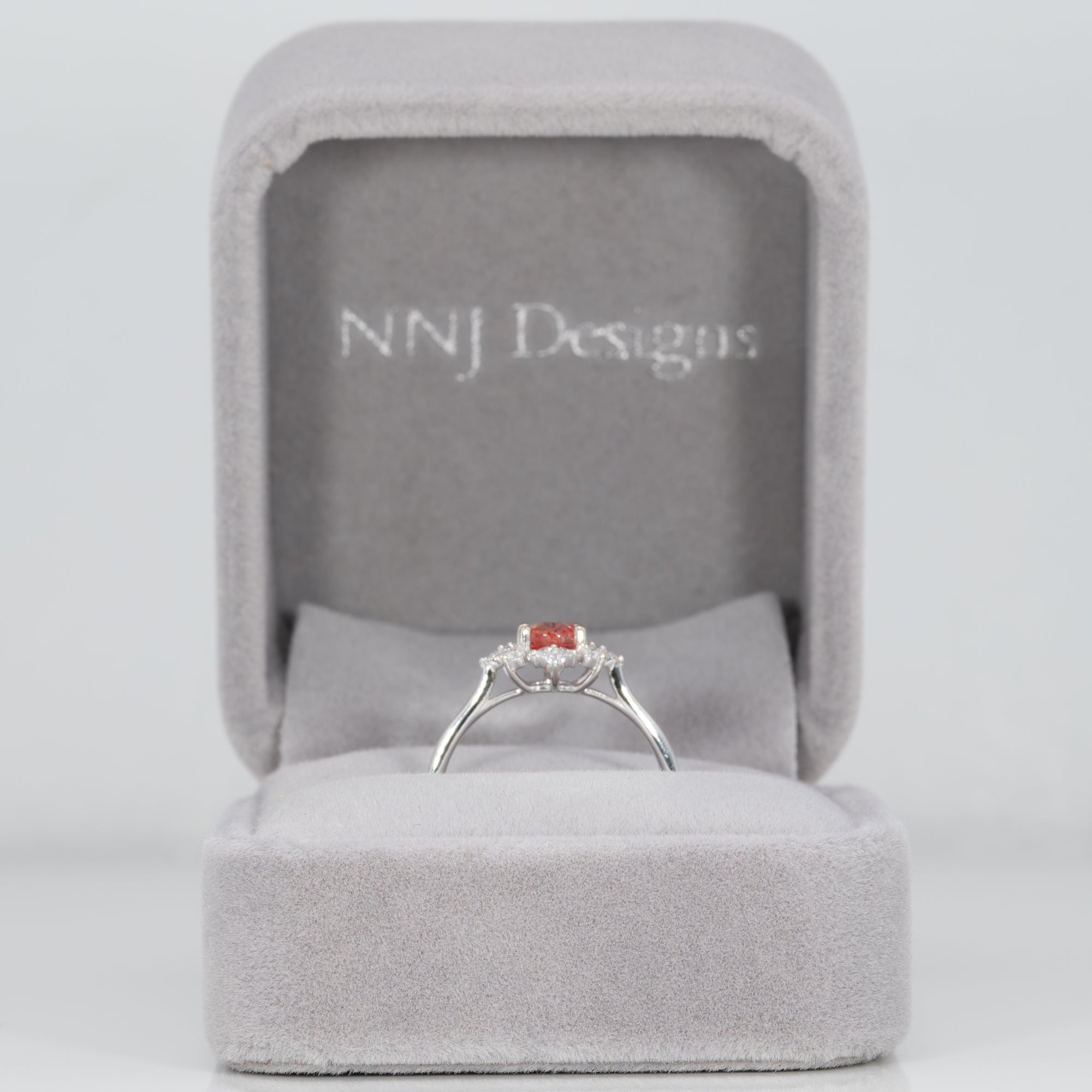 14K white gold padparadscha sapphire ring with diamond accents