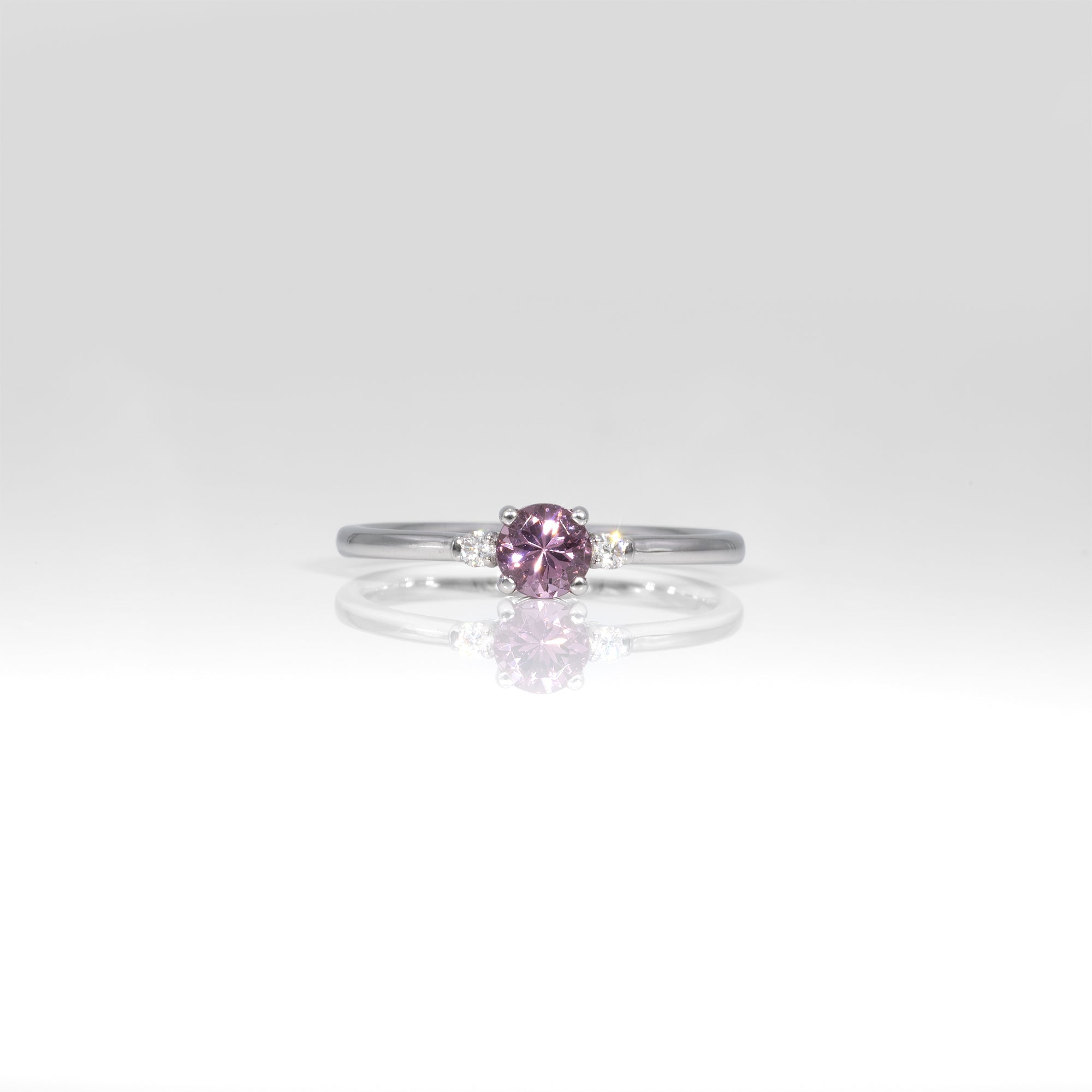 14K white gold minimal purple spinel ring with diamond accents