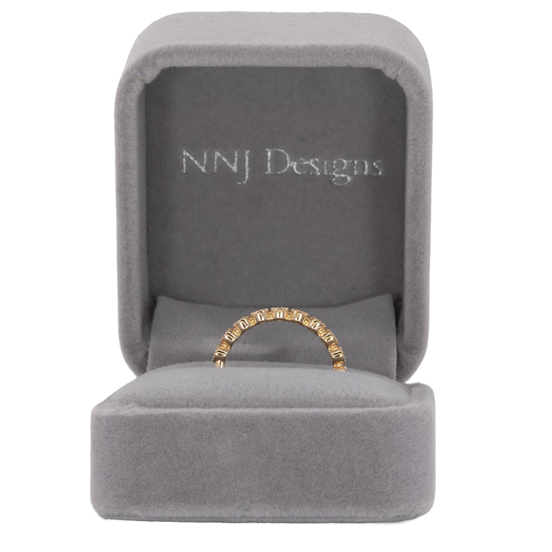 14K yellow gold band with round Zambian emerald accents