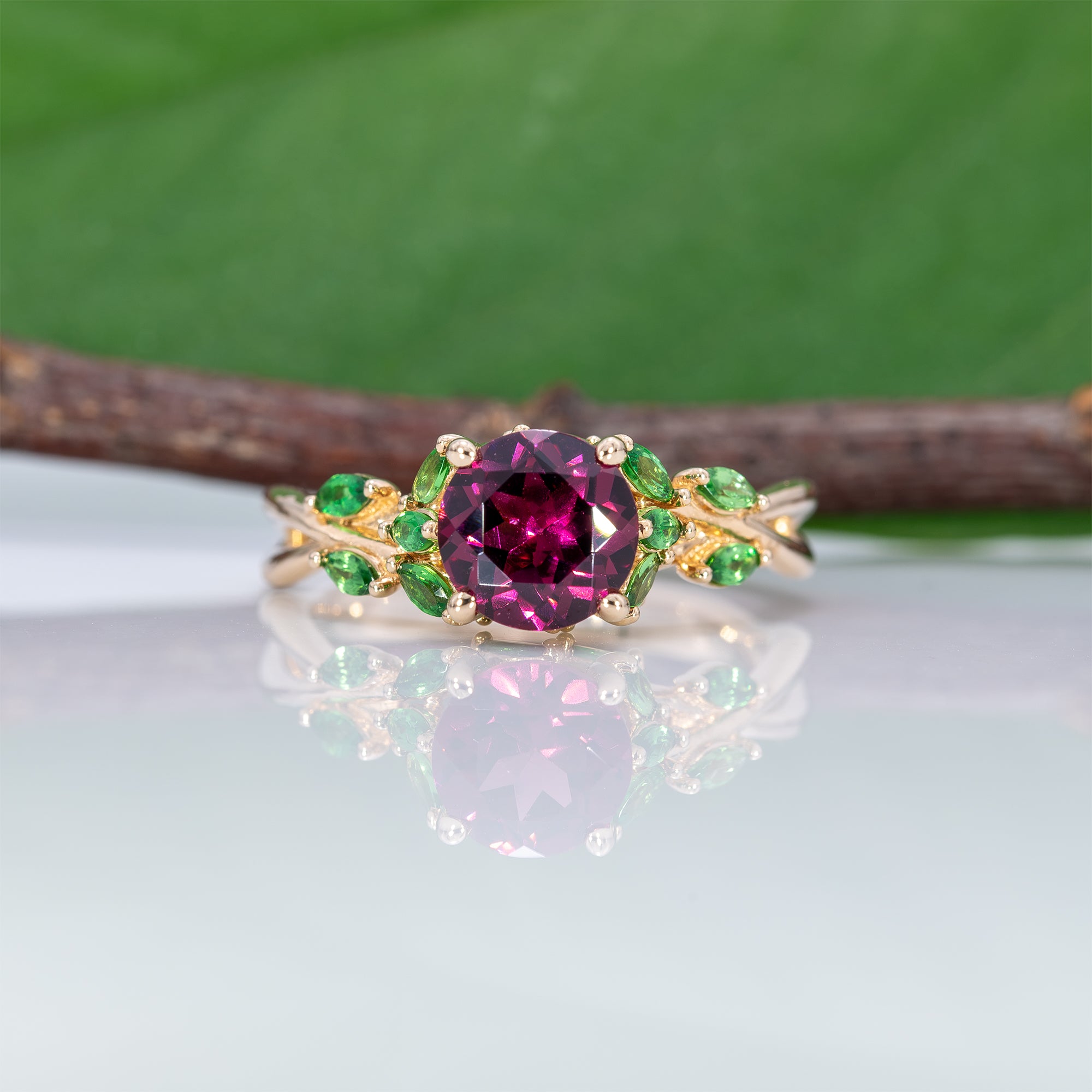 14K yellow gold purple garnet ring with tsavorite accents