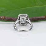 platinum lab grown diamond ring with blue sapphire accents
