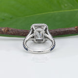 platinum lab grown diamond ring with blue sapphire accents