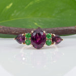 14K yellow gold purple garnet ring