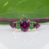14K yellow gold purple garnet ring