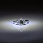 14K white gold pear alexandrite ring with diamond halo