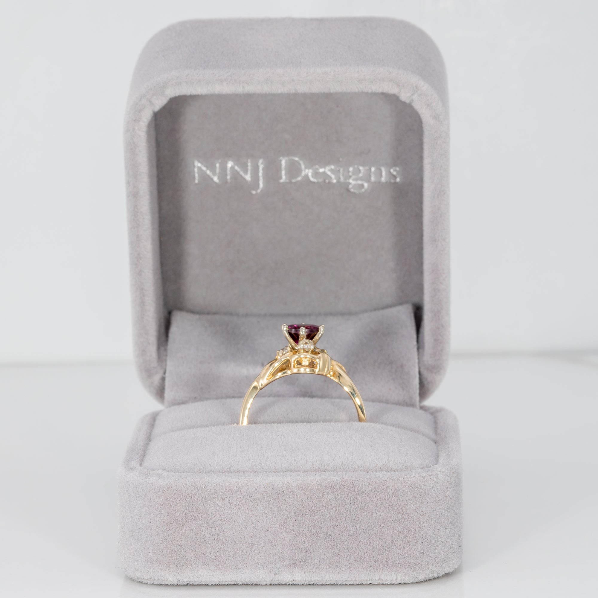 14K yellow gold purple garnet estate ring