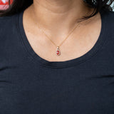 14K yellow gold padparadscha sapphire pendant