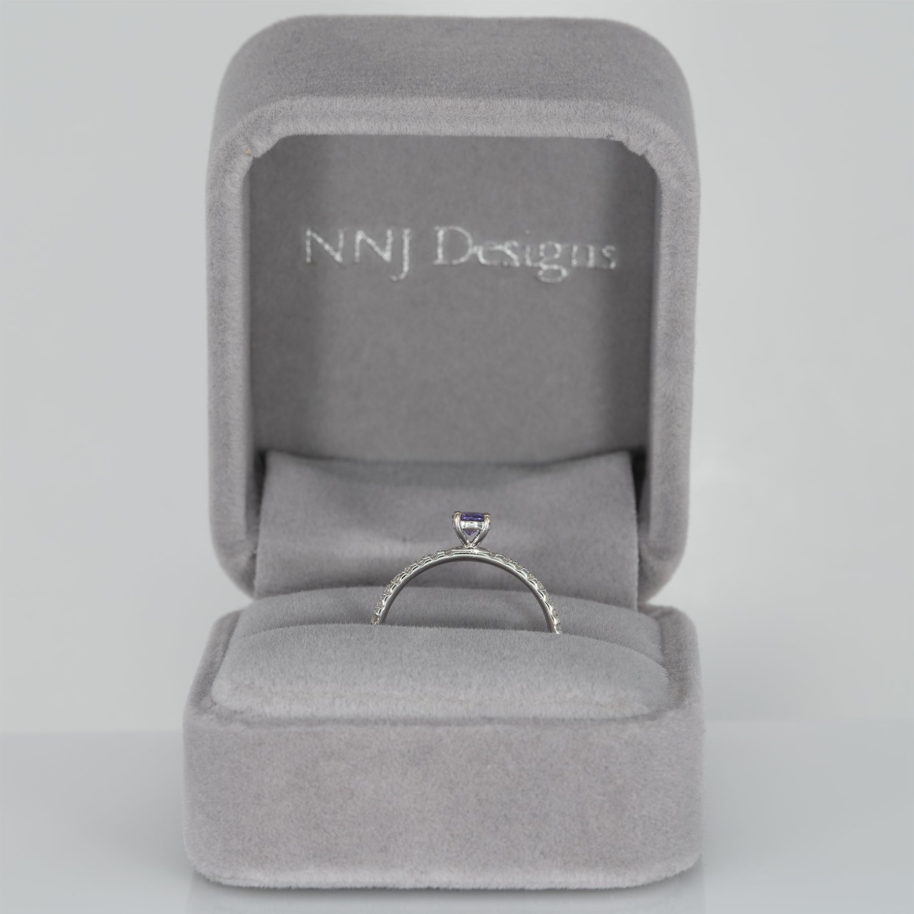 14K white gold purple sapphire round ring with diamond halo