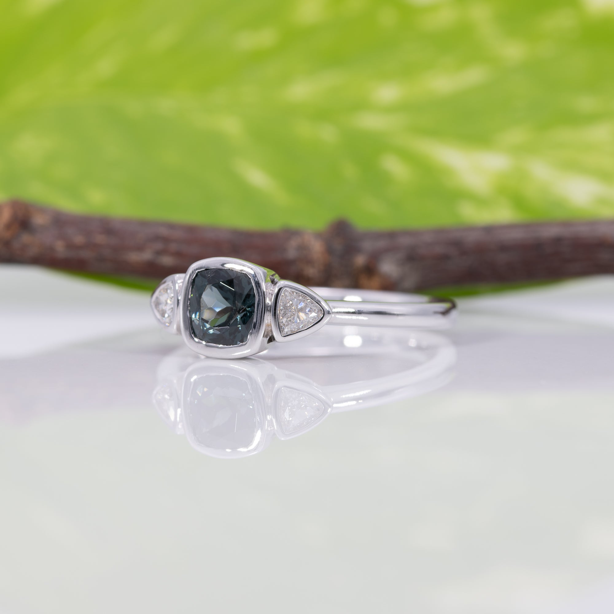 14K white gold blue spinel ring with diamond accents
