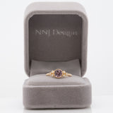 14K yellow gold purple spinel round ring with diamond accents