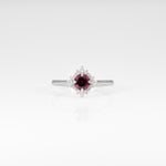 14K white gold red spinel ring with diamond halo