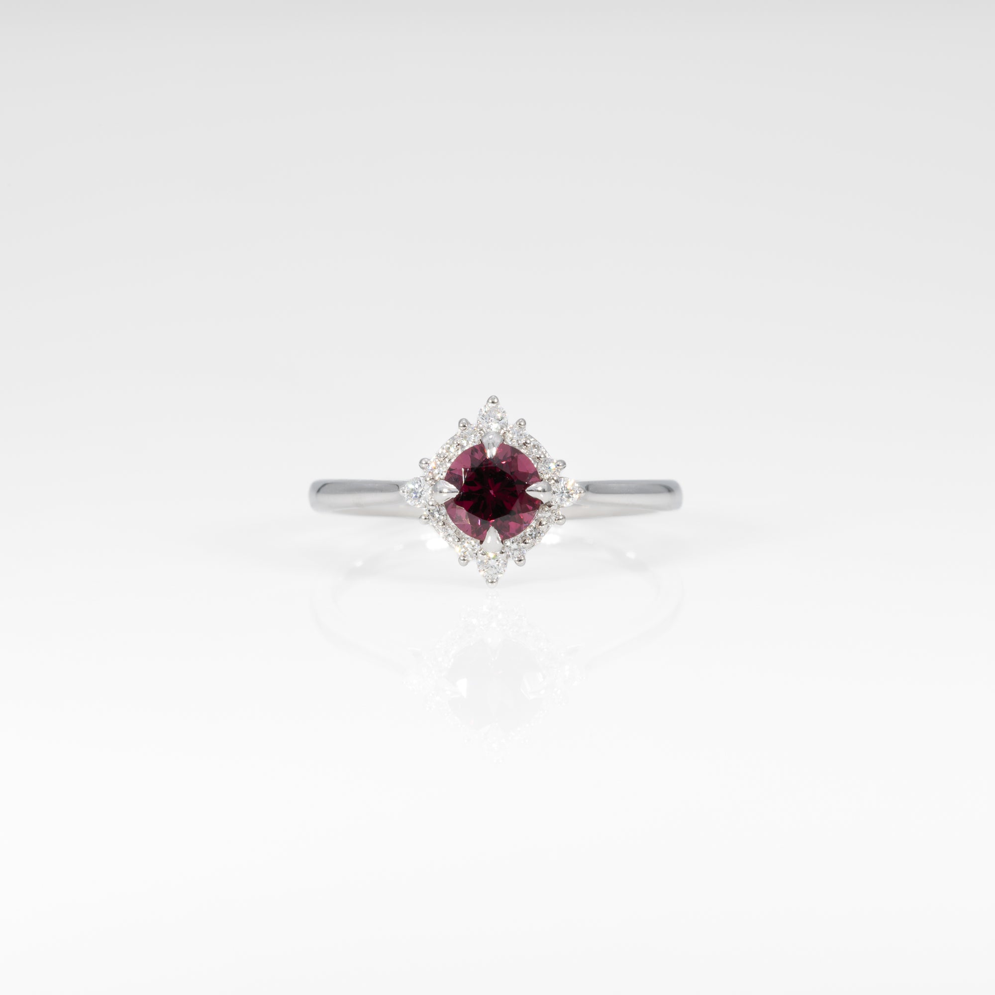 14K white gold red spinel ring with diamond halo