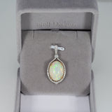 14K white & yellow gold ethiopian opal pendant with diamond accents