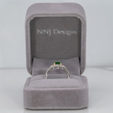 14K two-tone gold tsavorite garnet ring with diamond accents
