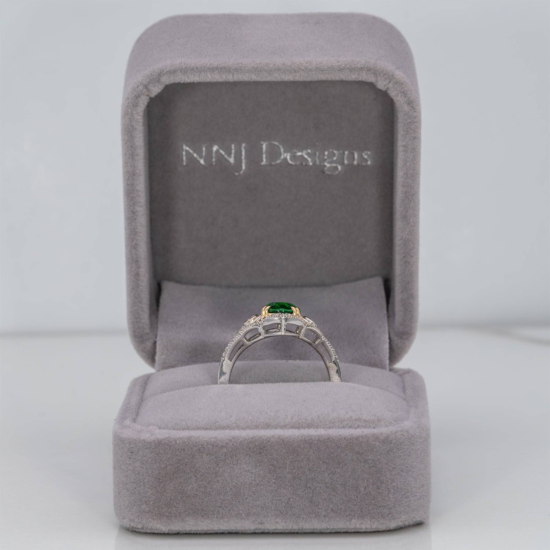 14K two-tone gold tsavorite garnet ring with diamond accents
