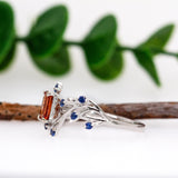 Varsha 14K Solid White Gold Orange Sapphire and Blue Sapphire Ring | EM 6x4mm
