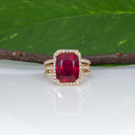 14K yellow gold Madagascar ruby ring with diamond halo