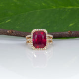 14K yellow gold Madagascar ruby ring with diamond halo