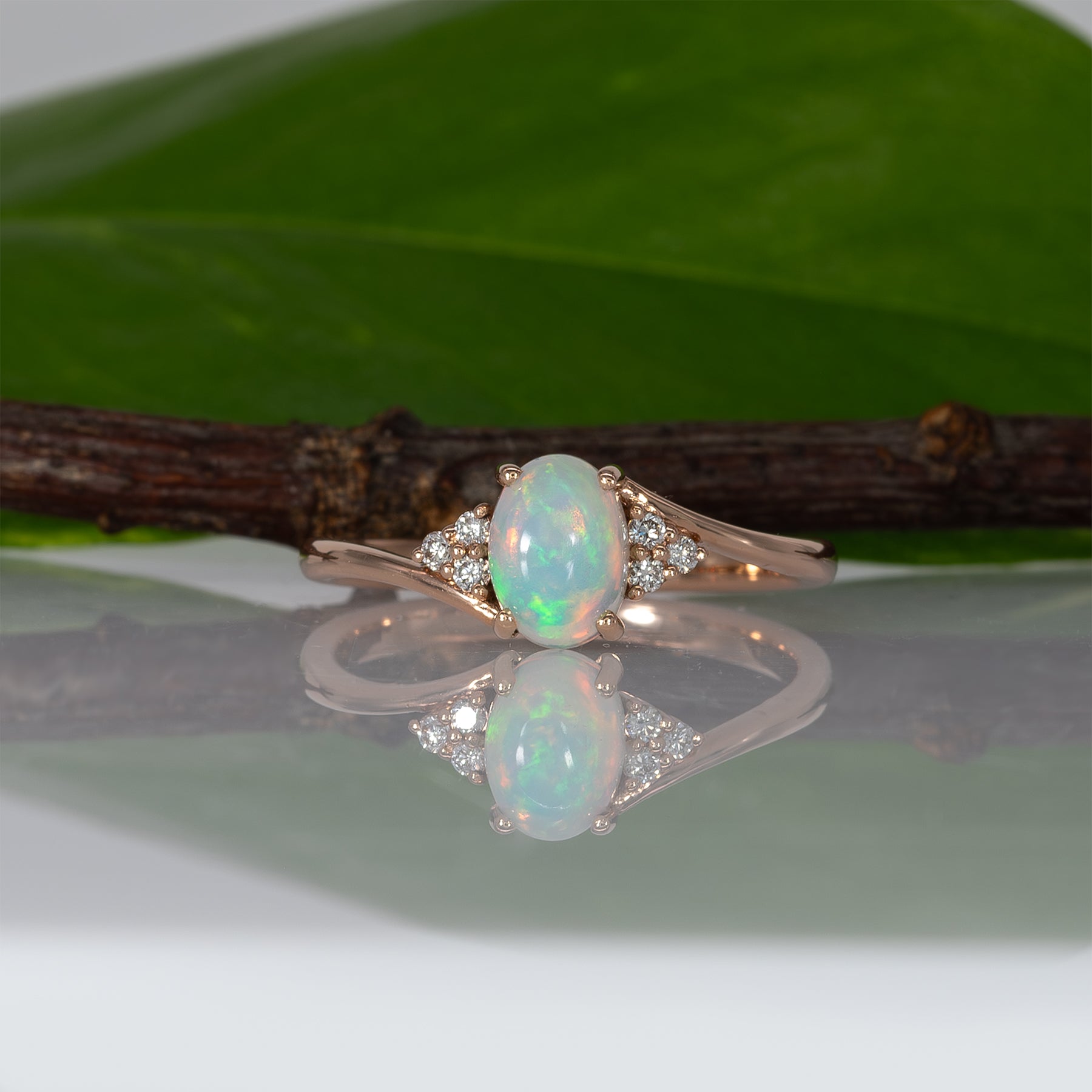 14K rose gold Ethiopian opal cabochon ring with diamond accents