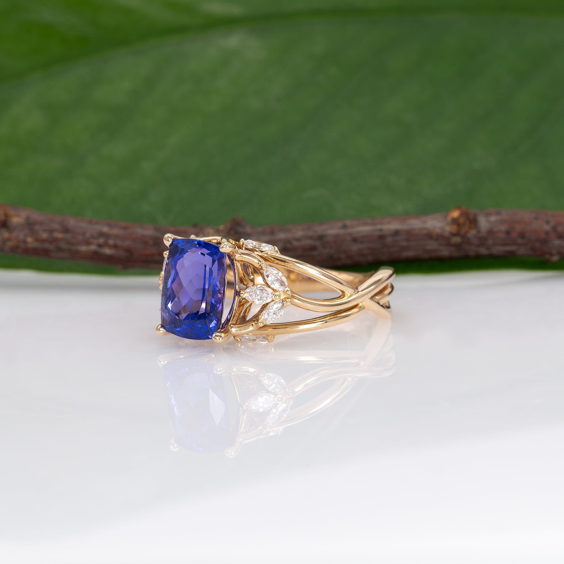 14K yellow gold cushion tanzanite ring with diamond accents